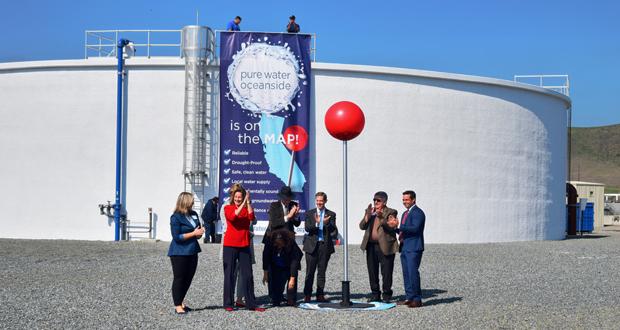 Officials plant a symbolic map pin at the location of the new Pure Water Oceanside advanced water purification project (Photo: Steve Marcotte/OsideNews)
