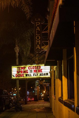 The south-facing La Paloma Theatre marquee proclaims “The Dove will fly again” late Thursday, March 19. The entertainment venue is closed during the COVID-19 coronavirus outbreak. (Photo by Jen Acosta)