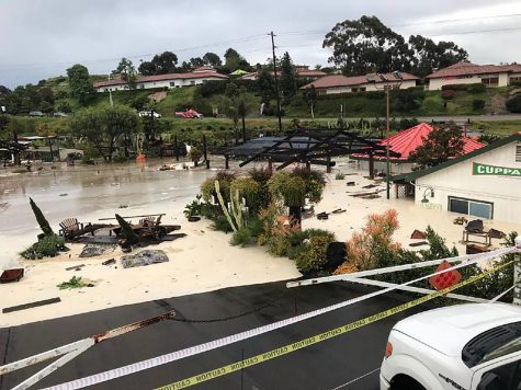 Flooding from heavy rain reaches the driveway and halfway up the windows of the Sunshine Gardens property in Encinitas on Friday, April 10. (Sunshine Gardens photo)