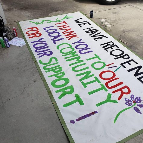 A sign sits ready to announce the reopening of North County Olive Oil in Encinitas, pictured Tuesday, April 21. The business, along with Sunshine Gardens on the same property, suffered damage in flooding after severe rain on Friday, April 10. (North County Olive Oil photo)