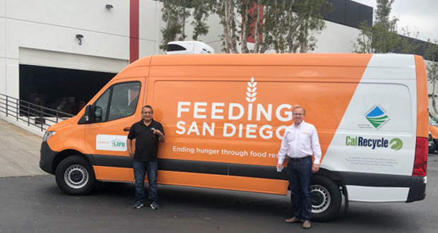 Tim Yzaguirre, Executive Director at Bread of Life Rescue Mission, picks up a new food rescue van from Feeding San Diego CEO Vince Hall. (courtesy photo)
