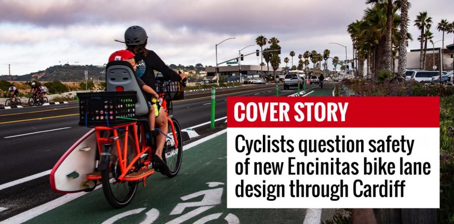 A woman rides a bicycle Wednesday, June 10, south along new protected bike lines on Coast Highway 101 through Cardiff in Encinitas. (Photo by Jen Acosta)