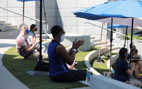 Faculty and staff, while social distancing and wearing face coverings, gathered on campus at Cal State San Marcos on Aug. 27 to hear university President Ellen Neufeldt’s Convocation address. (CSUSM public relations photo by Andrew Reed)