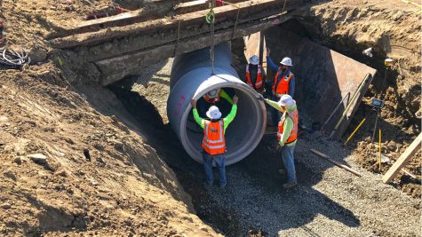 Crews continue work on the San Marcos Creek project, pictured in early June. City officials say completion is on track for spring 2023. (San Marcos city photo)