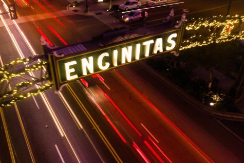 The Encinitas city sign over Coast Highway 101 is shown decorated with holiday lights in this 2018 file image. (Photo by Ian McDonnell, iStock Getty Images)