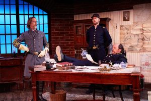 Bruce Turk (left), Brian Mackey (center) and Richard Baird (right) perform in the North Coast Repertory Theatre’s production of “Ben Butler,” on stage through Nov. 21 in Solana Beach. (NCRT photo by Aaron Rumley)