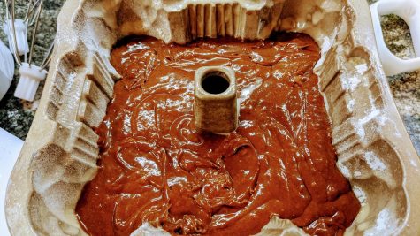 Rich gingerbread batter is ready to bake in a house form. (Photo by Laura Woolfrey Macklem)