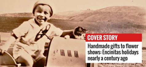 Roger Teten and cat play on a pedal-driven car in east Encinitas in 1930. (San Dieguito Heritage Museum photo)