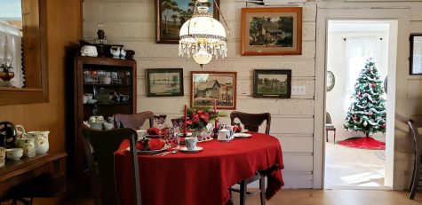 A display at the San Dieguito Heritage Ranch in Encinitas on Dec. 19 shows what a typical holiday dinner table might have looked like a century ago. (Photo by Charlene Pulsonetti)