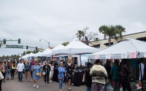 Visitors browse the vendors at the Encinitas Street Fair at the corner of D Street and South Coast Highway 101 on April 28, 2019. (NCC file photo by Cam Buker)