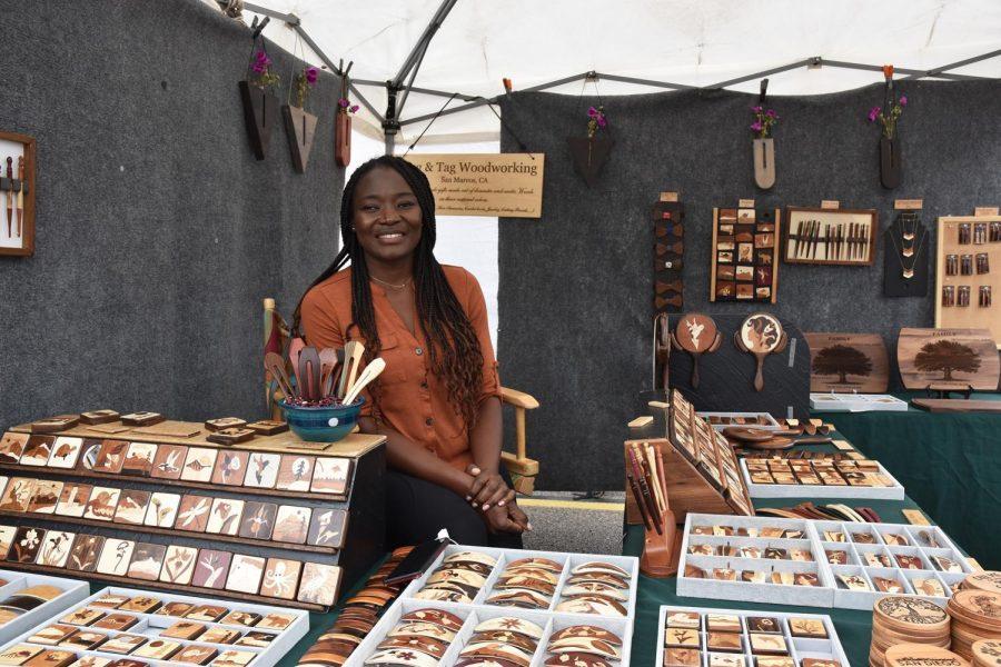 Corine Langsather, co-owner of Lang & Tag Woodworking in San Marcos, pictured April 10, had many return customers who had first seen her booth at the Encinitas Street Fair last fall. (Photo by Charlene Pulsonetti)