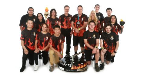 Oceanside “BattleBots” team Gigabyte, led by John Mladenik (center right), started as a hobby project 20 years ago and has grown into a major contender in the televised sport on the Discovery Channel. (BattleBots photo)