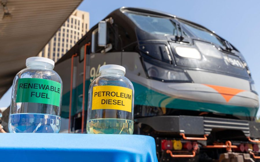Samples of renewable and diesel fuel are on display Wednesday, April 13, in Los Angeles at the celebration of Metrolink rail system’s 100% renewable-energy locomotive fleet. (Metrolink photo)
