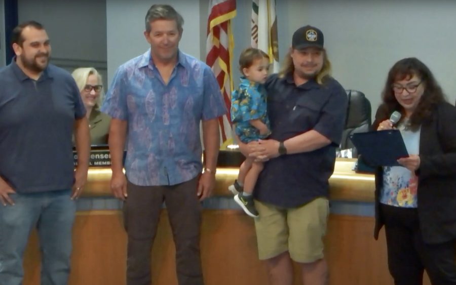 Oceanside Mayor Esther Sanchez (far right), standing with local brewery entrepreneurs and MainStreet Oceanside Chief Operating Officer Gumaro Escarcega (far left), announces a National Beer Day proclamation during the April 6 City Council meeting. (Oceanside city photo)