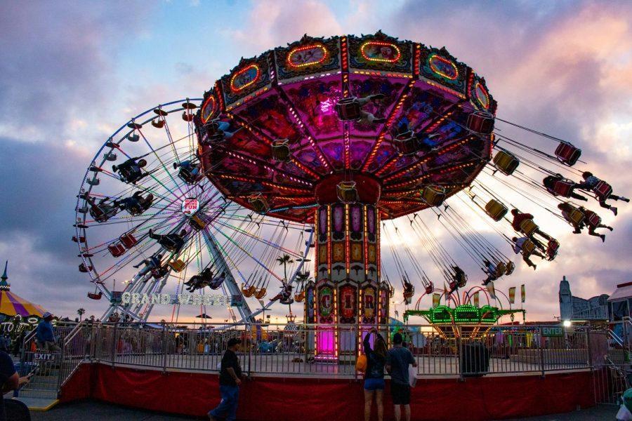 The swing ride is among the primary attractions at the San Diego County Fair, where attendees enjoyed the sunset from above the crowds on the evening of June 23, 2021. (NCC file photo by Bella Ross)