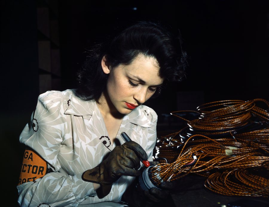 A worker checks electrical assemblies at Vega Aircraft Corp. in Burbank in 1942 during World War II. (Photo by David Bransby, Library of Congress collection)