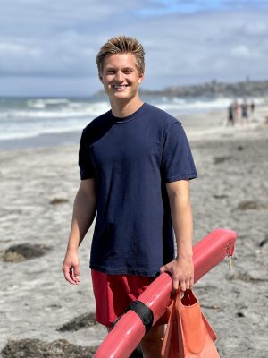 “I knew my goal in life, I wanted to help people. And that was really where my focus was,” says Project Moonlight founder and Encinitas lifeguard Jake Ratermann, shown at Cardiff beach on April 16. (Photo courtesy of William Roland)
