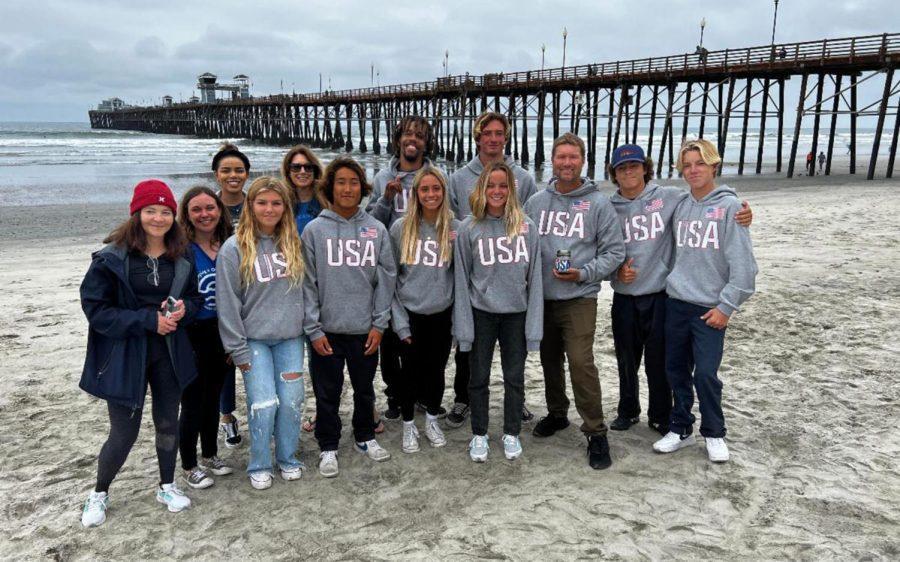Team USA juniors stand with Head Coach Ryan Simmons (third from right) and USA Surfing CEO Brandon Lowery (back center, left) near Oceanside Pier on May 23. (Courtesy photo)