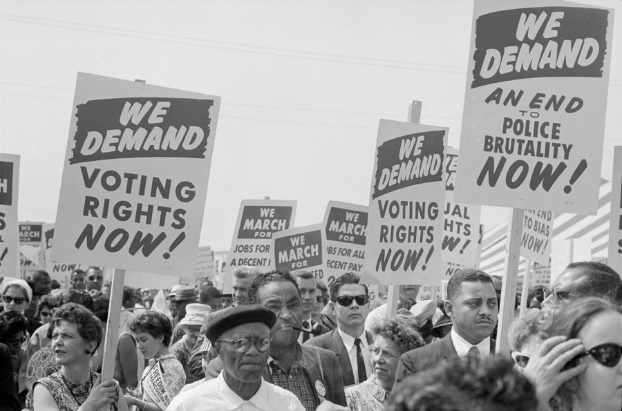Protestors carry signs at the March on Washington in 1963. (Photo by by Marion S. Trikosko, Library of Congress collection)