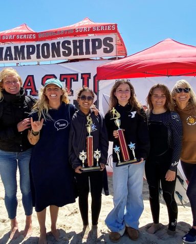 San Dieguito High School Academy's girls surf team members celebrate their recent National Scholastic Surfing Association State Championship. (Courtesy photo)