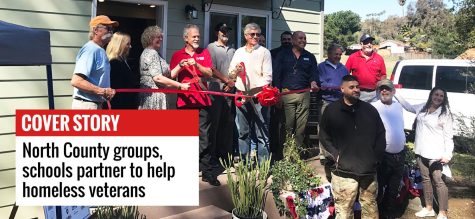 Representatives from groups including Warrior Village Project and Wounded Warrior Homes stand in front of an accessory dwelling unit at a ribbon-cutting ceremony on June 23, 2021. (Warrior Village Project photo)