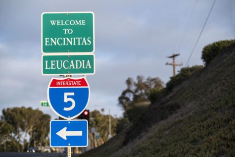 A sign at La Costa Avenue and Coast Highway 101 in Leucadia directs drivers east to Interstate 5. (Photo by Doug Berry, iStock Getty Images)