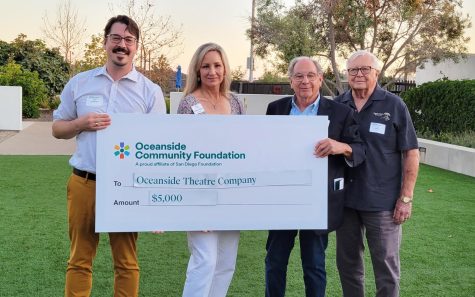 Left to right: Oceanside Theatre Co. representatives Alex Goodman, Leann Garms, John McCoy and Ed Parish accept a $5,000 grant from the Oceanside Community Foundation on Aug. 30. (Courtesy photo)