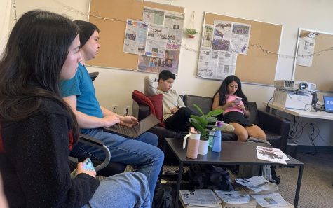 California State University San Marcos Cougar Chronicle staff members (left to right) Magali Arcena, Eric Hendricks, Luke Vore and Nadia Houneini participate in the student newspaper’s regular Tuesday news meeting on Nov. 1. (Photo by Marbella Ramirez, Cougar Chronicle)
