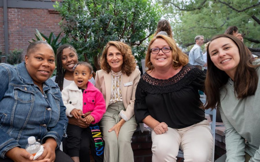 Home Start Inc. CEO Laura Tancredi-Baese, fourth from left, meets with attendees of the San Diego nonprofit’s 15th Annual Hallo-Wine Festival fundraiser on Oct. 22 (Home Start photo by Travis Land, Discover Magazines)