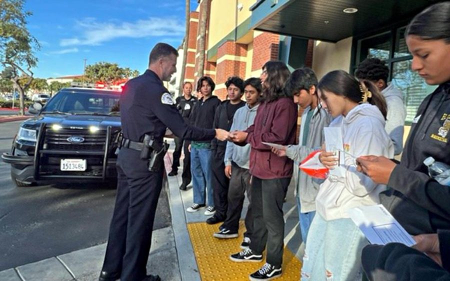 Oceanside high school district student-athletes spend time with city police officers on Nov. 22 for a morning of shopping at Dick’s Sporting Goods in Oceanside. (OPD photo)