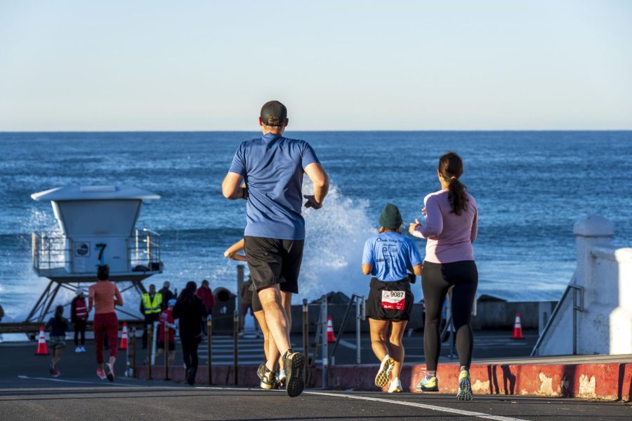 Runners get a view of the king tide on Nov. 24 at the annual O’side Turkey Trot in Oceanside. (Event photo by Rich Cruse)