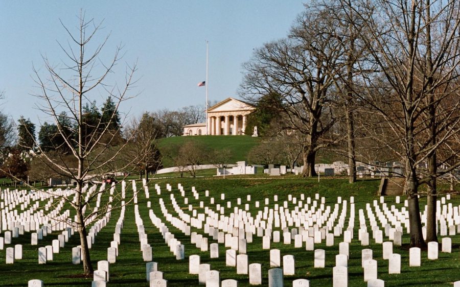 The Robert E. Lee mansion, pictured in March 2022, forms a backdrop at Arlington National Cemetery. (Photo by Chad Stembridge via Unsplash)