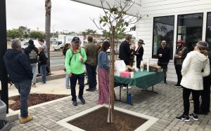 Residents gather for a ribbon-cutting celebation at the new Shatto building in the Encinitas community of Leucadia on June 1. (Jim Shatto photo)