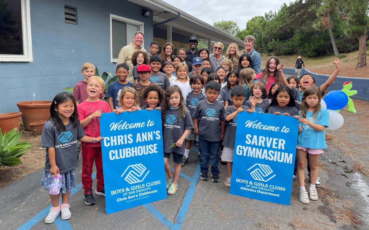 Boys+%26+Girls+Clubs+of+San+Dieguito+children+and+staff+members+celebrate+the+recent+renaming+of+the+gym+at+the+Griset+Branch+in+Encinitas+for+Director+of+Athletics+Davion+Sarver+%28pictured+back+row%2C+center%29.+%28Courtesy+photo%29