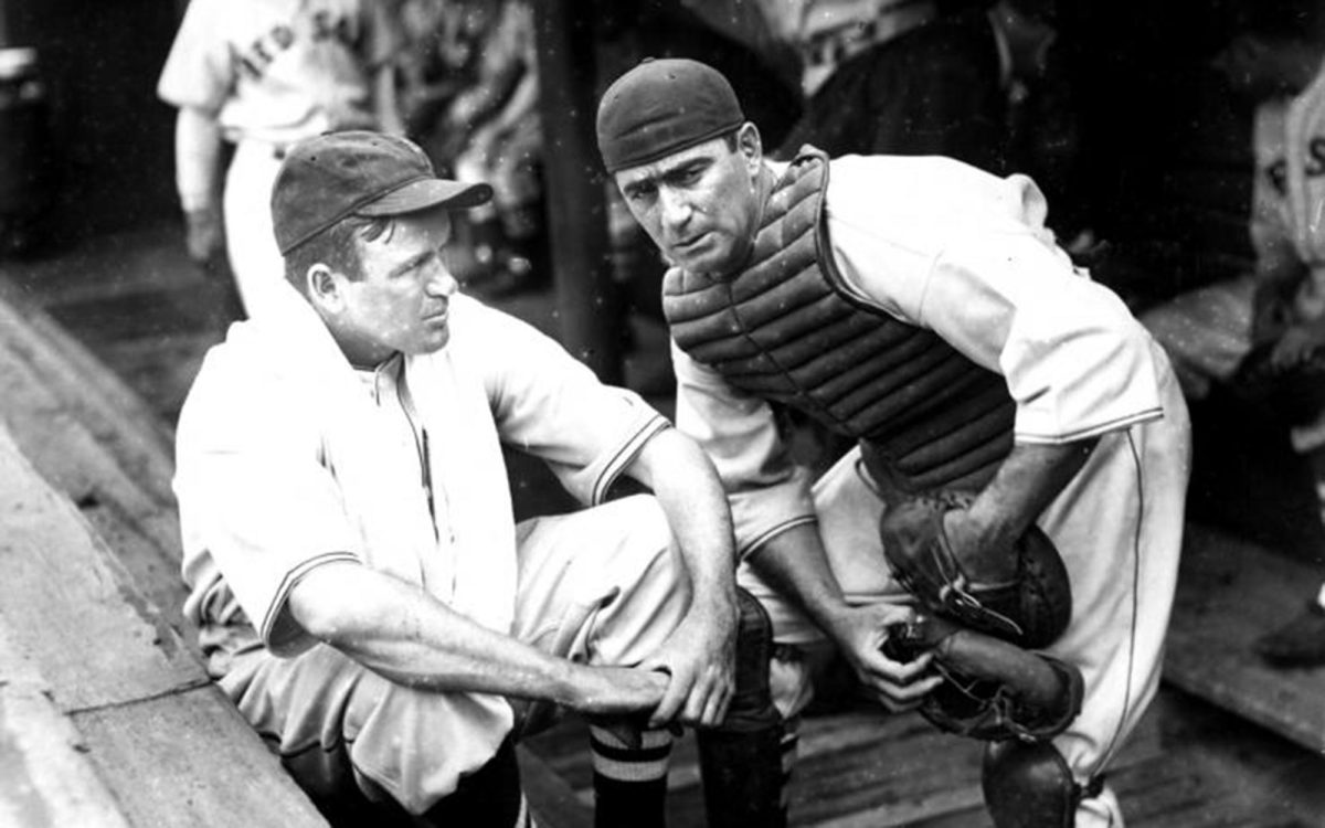 Boston Red Sox catcher Moe Berg (right) talks with player-manager Joe Cronin in the dugout in 1937. (Photo from the Moe Berg Papers, Manuscripts Division, Department of Rare Books and Special Collections, Princeton University Library)