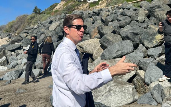 Rep. Mike Levin, D-49th District, tours bluff-side train tracks in San Clemente on Jan. 25, where landslide that blocked tracks in the area a day before. (Levin Office social media photo)