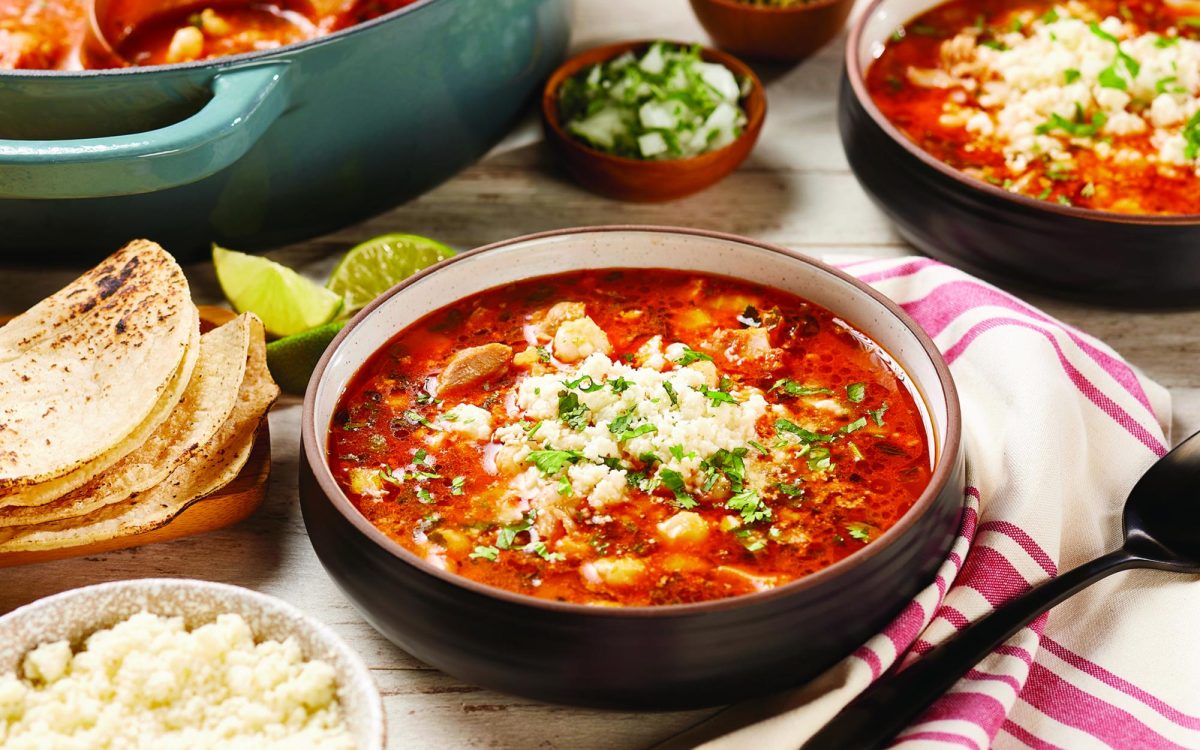 Smoky Chorizo and Chicken Pozole relies on the bold, hearty, spicy taste of pork chorizo combined with handcrafted Homestyle Salsa. (Cacique photo via Family Features)