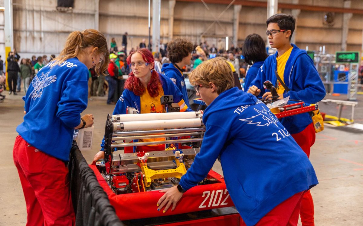 Team Paradox members from San Dieguito High School Academy in Encinitas work on their robot. (Team Paradox photo)