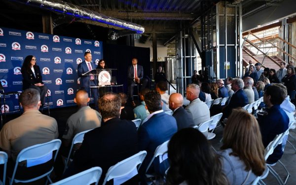 Frontwave Arena CEO Josh Elias addresses officials and media on Monday, March 11, during an event announcing that the San Diego Clippers G League basketball team would play at the Oceanside venue, which is currently under construction. To the left of Elias is Halo Sports and Entertainment CEO Gillian Zucker. Oceanside Mayor Esther Sanchez is to his right. At far right is NBA G League President Shareef Abdur-Rahim. (LA Clippers photo)