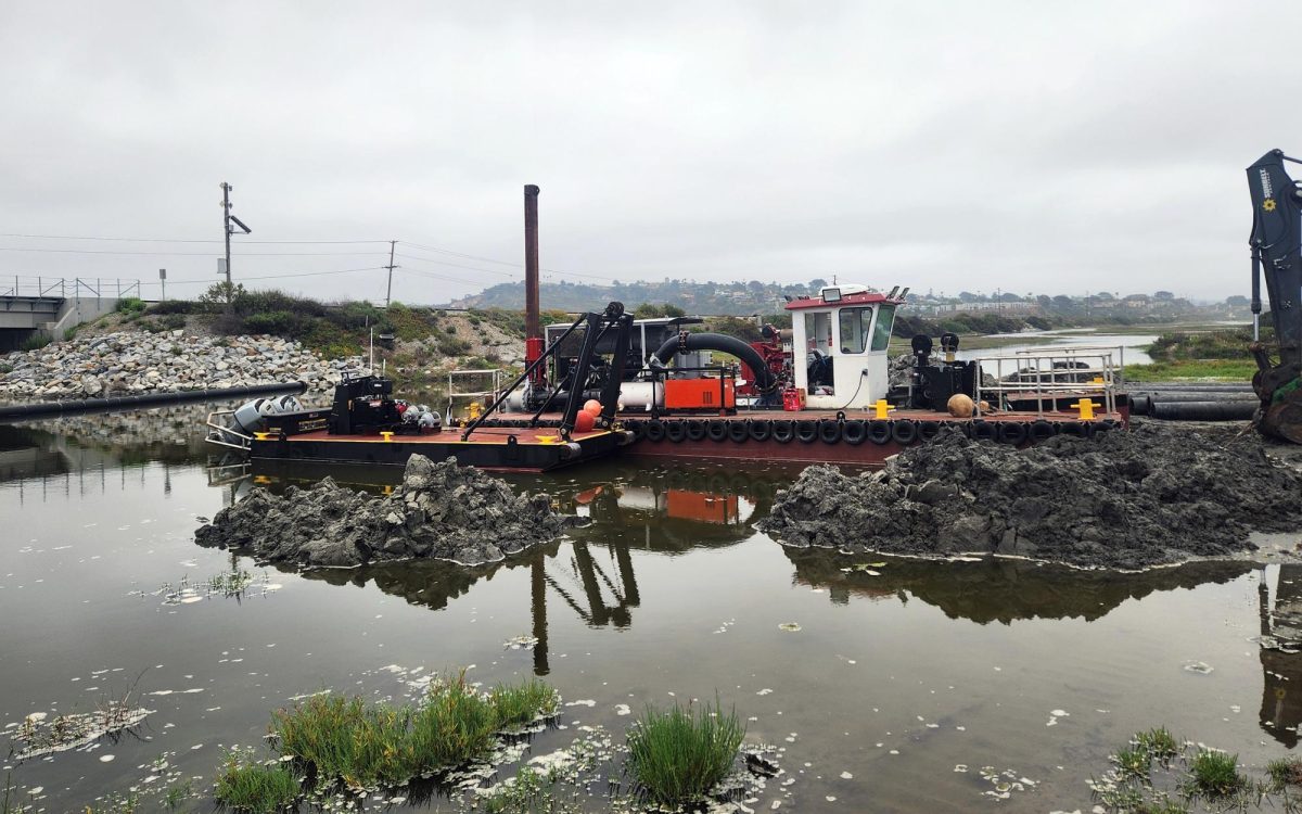 Dredging machinery stands ready June 17 for a long-awaited project at the inlet of San Elijo Lagoon in Encinitas. (Nature Collective photo)