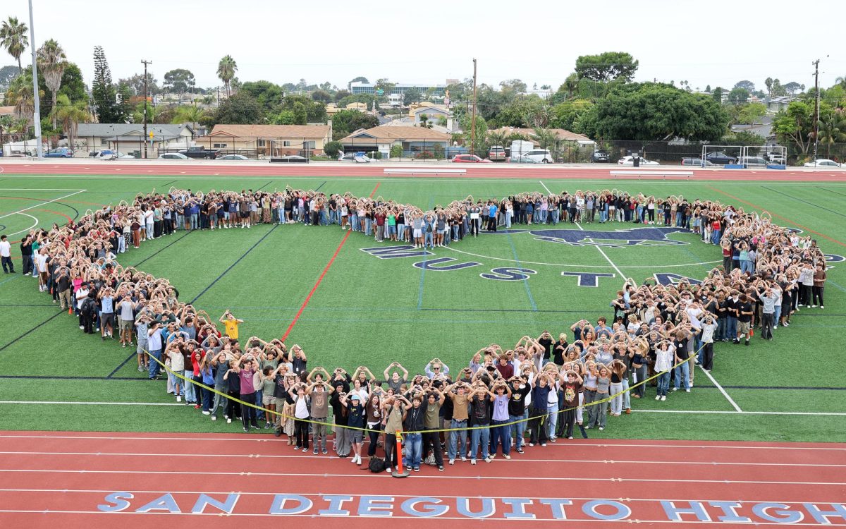 Hundreds of students, educators and staff members gather at San Dieguito Academy’s main athletic field Sept. 25 in a demonstration of unity against hate after a reported antisemitic incident on the Encinitas high school campus. (Photo by Edwin Mendoza, San Dieguito Union High School District)