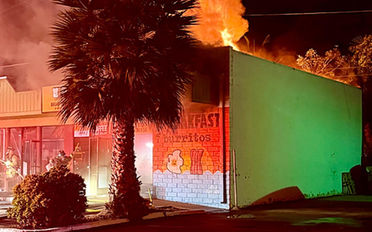 Fire burns at Bread & Cheese and Breakfast Burritos in Oceanside on Dec. 23. (Bread & Cheese social media photo by Justin Frank)