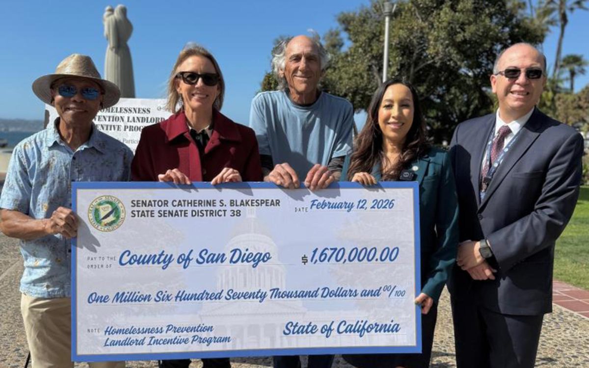 Pictured Feb. 12 left to right in front of San Diego County headquarters: Eddie Walker, property manager for Quint Apartments; state Sen. Catherine Blakespear, D.38th District; Greggory Bottoni, veteran participating in the county’s rental assistance program; Supervisor Paloma Aguirre, chair pro tem of the San Diego County Board of Supervisors; and David Estrella, director of San Diego County Housing and Community Development Services. (Blakespear office photo)