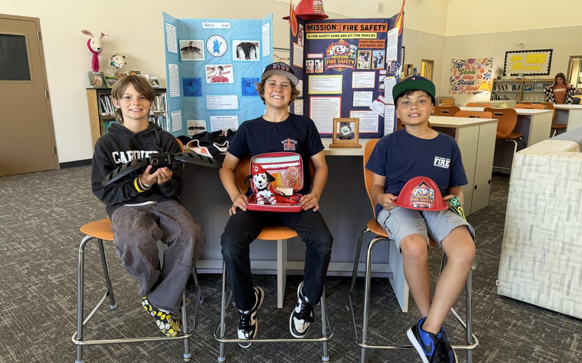Ada Harris School student inventors Quinn Gates, Caden Newsham and Kaden Lain (left to right), pictured May 1 at the Cardiff campus, are heading to the RTX Invention Convention U.S. Nationals 2026. (Cardiff School District photo)