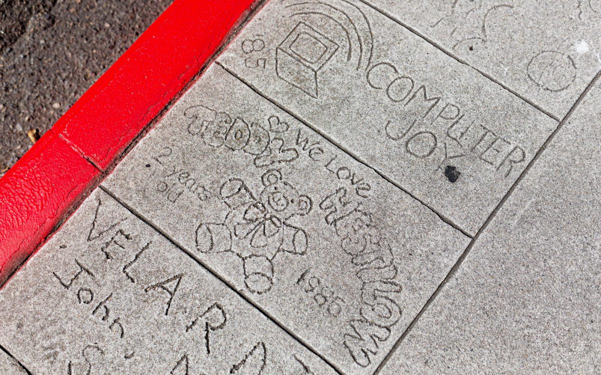 Tiles, such as these pictured April 28, 2021, were installed along Birmingham Drive in Cardiff in the 1980s as part of the Own a Piece of the Walk campaign, which raised funds to install a sidewalk at a time San Diego County funds were not available. The community campaign took place before the city of Encinitas was created. (NCC file photo by Jen Acosta)